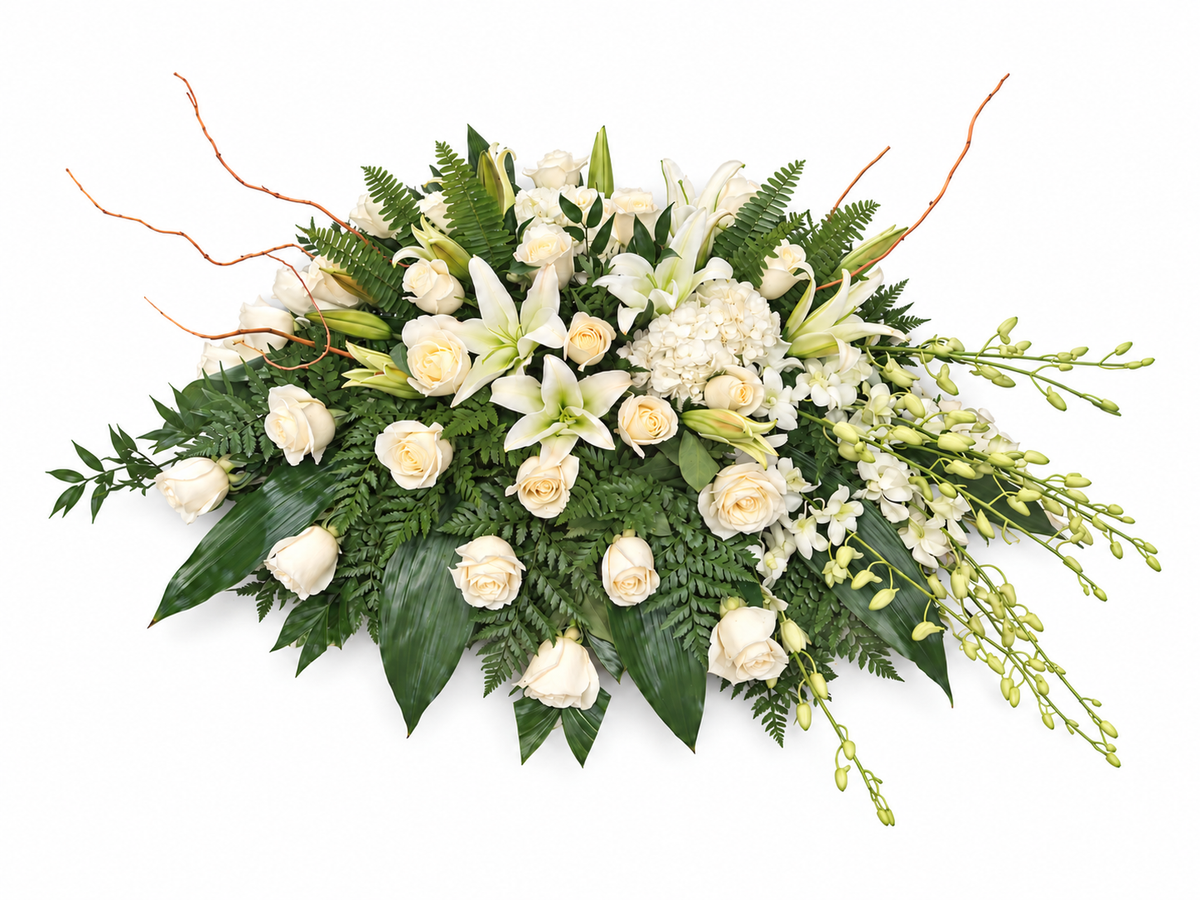Evergreen Remembrance Casket Spray with white flowers and lush cascading greenery